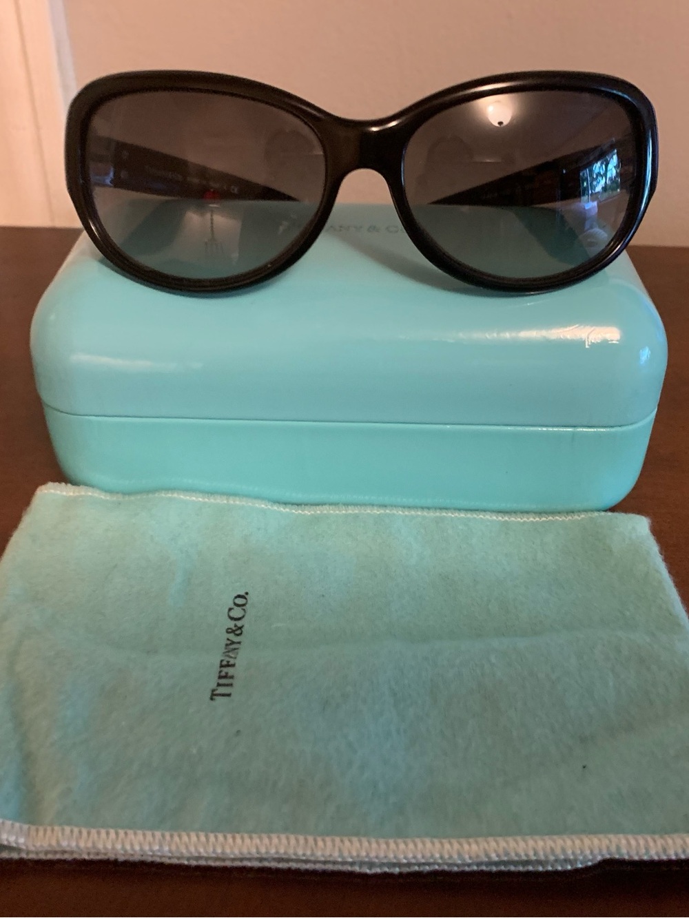 Tiffany & Co. Black Women's Oval Sunglasses with Dark Lenses